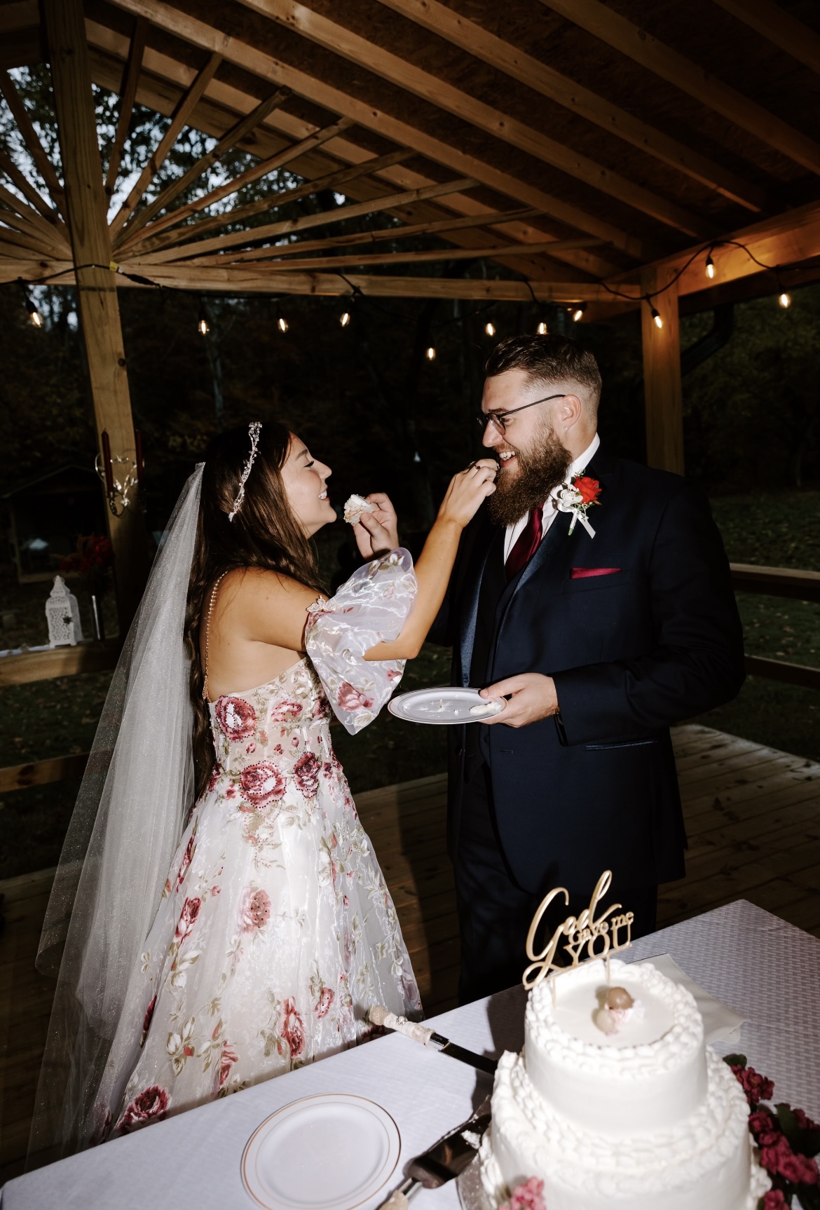 Couple by Buffalo Creek at Rooster Run wedding venue